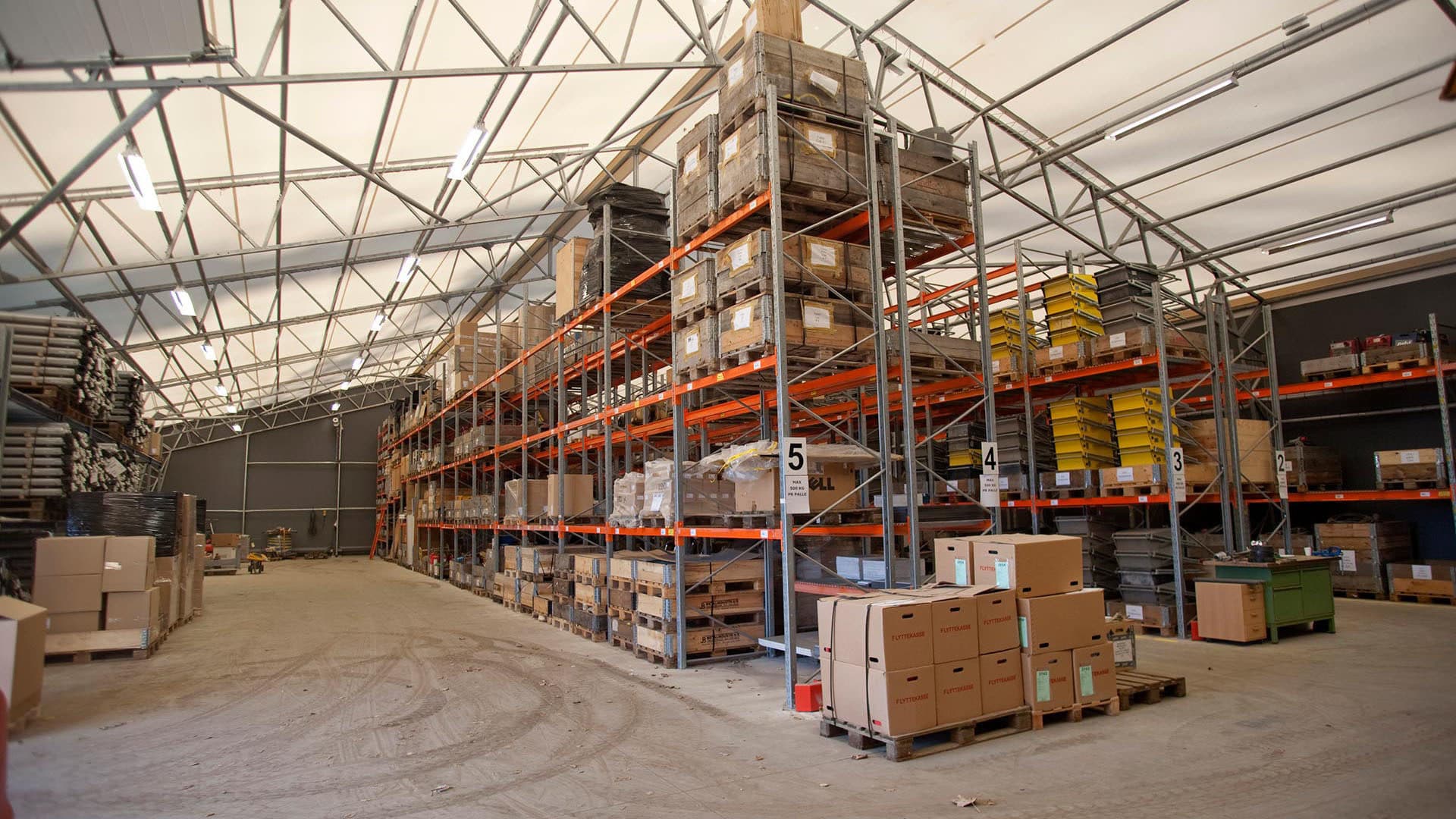 Boxes stored on metal shelves in a distribution centre