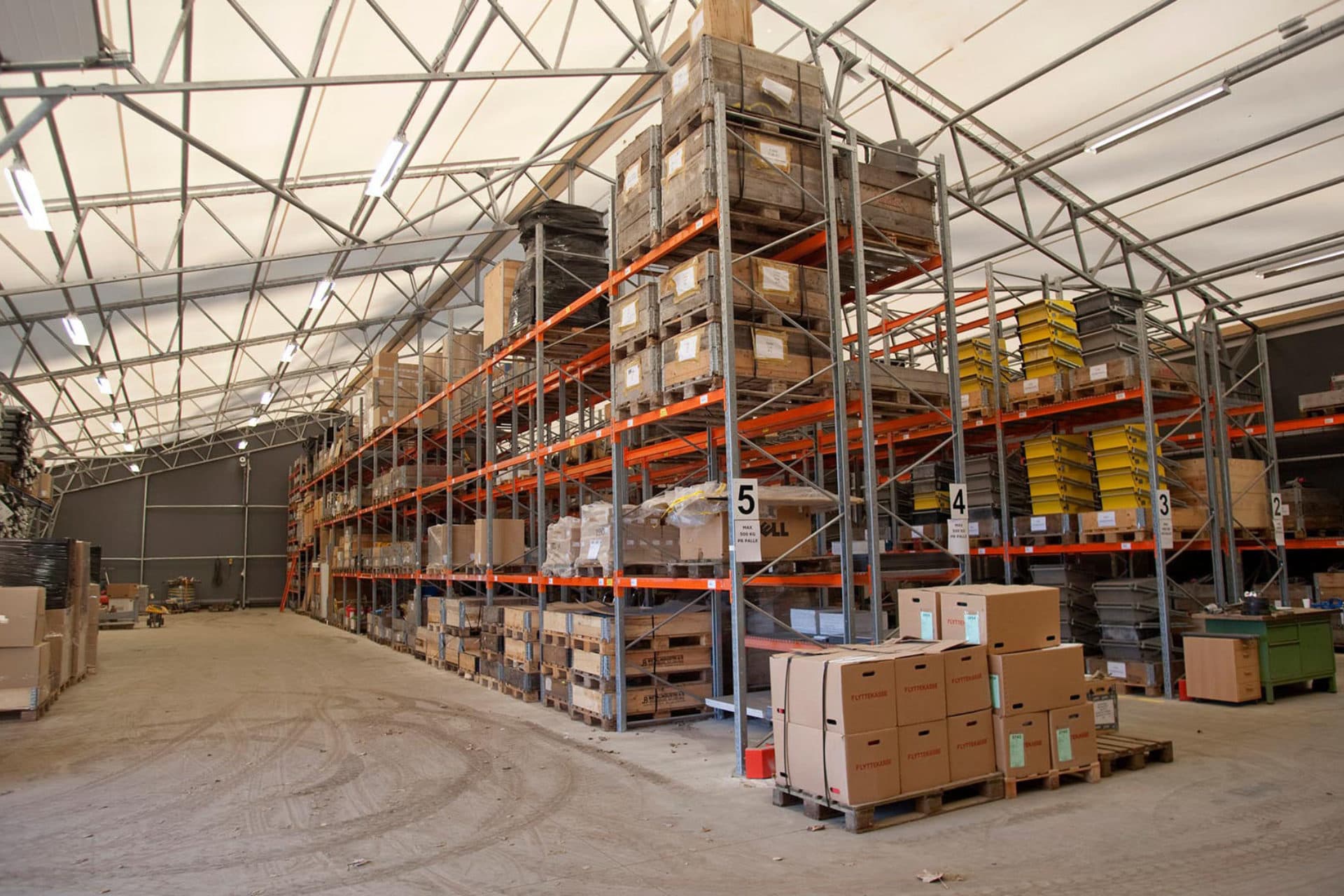Boxes stored on metal shelves in a distribution centre