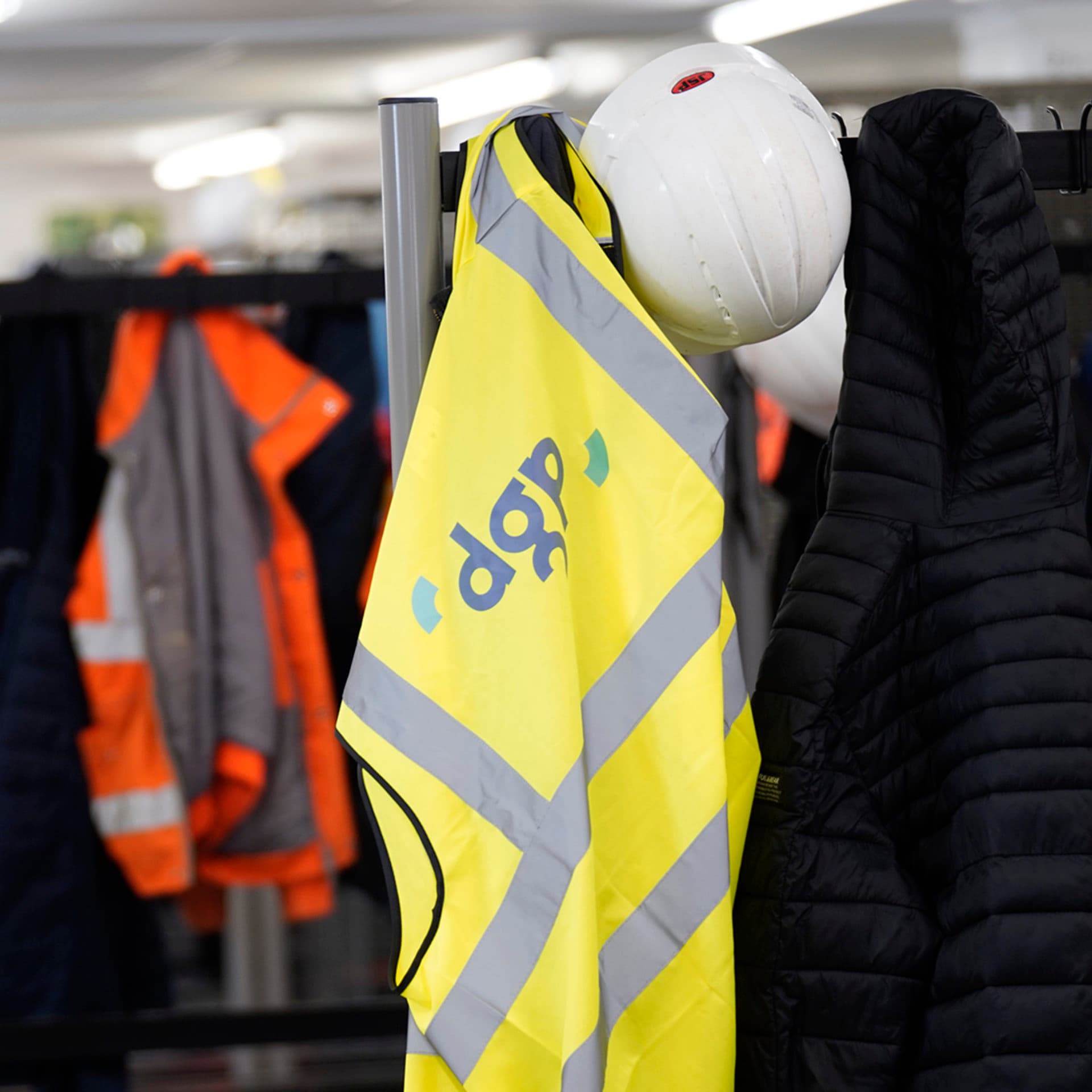 PPE hanging in a cloakroam