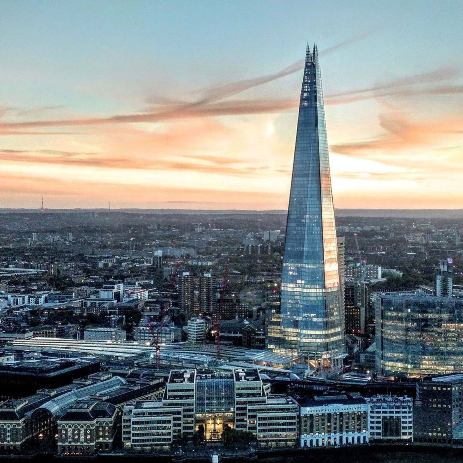 The Shard against a sunset and London skyline